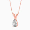 Rose gold necklace with a teardrop-shaped diamond pendant on a white background