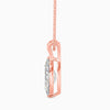 Rose gold pendant with a diamond on a white background
