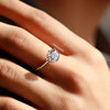 gift for her with solitaire engagement ring.