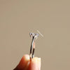 tulip setting and 6 prong setting.