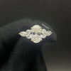 Oval cut diamond ring with marquise diamond.
