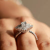 snow flake diamond ring paired alongside oval cut diamond.
