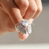 Lab grown diamond with 3 claw prong setting.