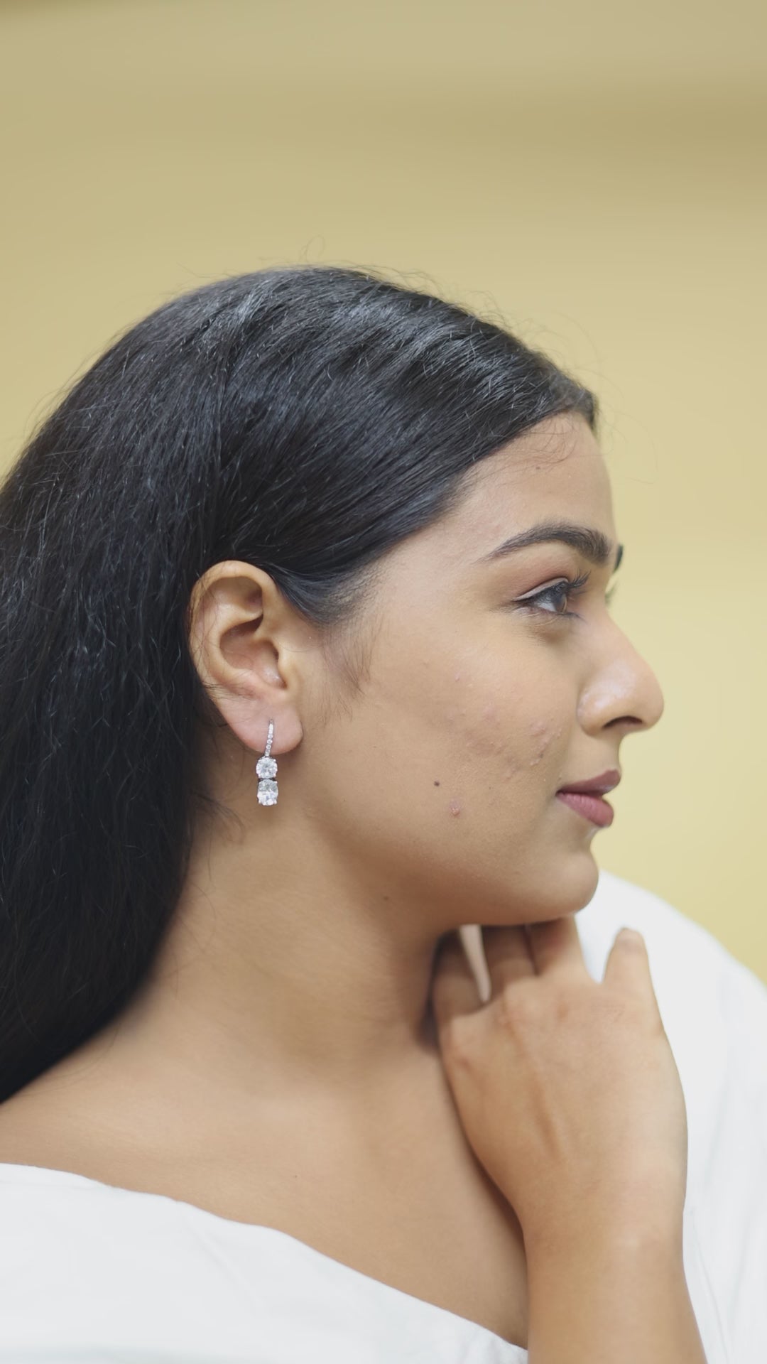 Two stone earrings with round brilliant cut diamond IGI certified earrings 
